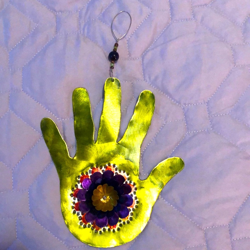 Small metal wall art made by Kipling Creations.